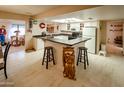 Eat-in kitchen with ample counter space and white cabinets at 2613 E Michigan Ave, Phoenix, AZ 85032