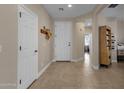 Bright and spacious entryway with tile flooring and ample storage at 5089 S Harvest St, Gilbert, AZ 85298