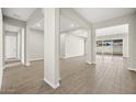 Open living area with tile floors and large windows at 10229 N 177Th Dr, Waddell, AZ 85355