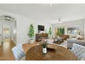 Spacious living room with hardwood floors and large windows at 1381 W Birch Rd, Queen Creek, AZ 85140
