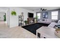 Spacious living room with sectional sofa and large TV at 21269 W Haven Dr, Buckeye, AZ 85396