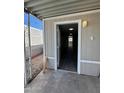 Front entrance with view into living area, featuring wood-look flooring at 245 S 56 St # 174, Mesa, AZ 85206
