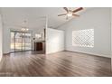 Open dining area with kitchen access and backyard view at 5518 W Mercury Way, Chandler, AZ 85226