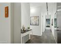 Bright hallway with contemporary flooring and wall art at 7120 E Kierland Blvd # 218, Scottsdale, AZ 85254
