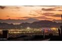 Stunning nighttime city and mountain views from property at 11098 E Whistling Wind Way, Scottsdale, AZ 85255