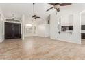 Bright living room with tile floors and high ceilings at 13345 W Cypress St, Goodyear, AZ 85395