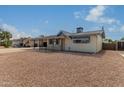 Front view of a single story home with rock landscaping at 1416 S Lawther Dr, Apache Junction, AZ 85120