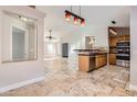 Modern kitchen featuring stainless steel appliances and granite countertops at 18487 N 111Th Dr, Surprise, AZ 85378