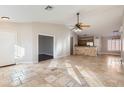 Spacious living room with tile floors and high ceilings at 18487 N 111Th Dr, Surprise, AZ 85378