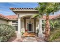 Elegant entryway with columns and a welcoming front door at 19530 E Via Del Oro --, Queen Creek, AZ 85142