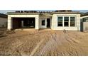 House under construction, showing framing and exterior sheathing at 22708 E Lords Way, Queen Creek, AZ 85142