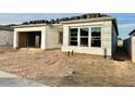 Unfinished home exterior, showing framing and exterior walls at 22708 E Lords Way, Queen Creek, AZ 85142