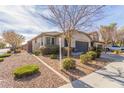 House exterior with gray garage door and desert landscaping at 2981 E Nighthawk Way, Phoenix, AZ 85048