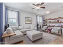 L-shaped sofa, ottoman, and built-in shelving at 2981 E Nighthawk Way, Phoenix, AZ 85048