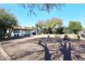 House exterior showing a front yard with gravel and cactus plants at 3502 N 22 St, Phoenix, AZ 85016