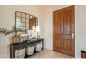 Bright entryway with console table, mirror, and stylish decor at 3729 E Donald Dr, Phoenix, AZ 85050