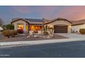 House exterior at dusk with landscaping at 4914 W Comanche Dr, Eloy, AZ 85131