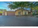 Spacious home with a three-car garage and attractive curb appeal at 6502 N 81St Pl, Scottsdale, AZ 85250