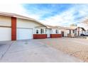 Newly renovated brick home with a spacious driveway at 6820 N 81St Ln, Glendale, AZ 85303