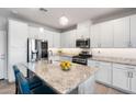 Sleek kitchen with granite countertops and stainless steel appliances at 730 E Zesta Ln # 101, Gilbert, AZ 85297