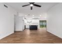 Open floor plan with kitchen island and modern finishes at 1243 N Terripin --, Mesa, AZ 85207
