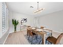 Modern dining room featuring a wood table and stylish decor at 14866 W Windsor Ave, Goodyear, AZ 85395