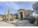 Single-story home with desert landscaping and two saguaro cacti at 17421 E Via Del Oro --, Fountain Hills, AZ 85268