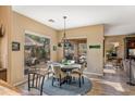 Bright breakfast nook with view of backyard and access to patio at 27608 N Montana Dr, Rio Verde, AZ 85263