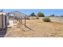 Expansive backyard with storage shed and gated area at 3312 E Flower St, Phoenix, AZ 85018