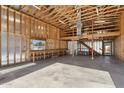 Spacious garage with loft and built-in shelving at 3312 E Flower St, Phoenix, AZ 85018