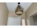Entryway featuring an ornate chandelier and neutral-toned walls at 8014 E Plata Ave, Mesa, AZ 85212