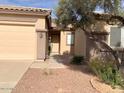 Home with desert landscaping in front and a well-maintained front yard, creating a welcoming curb appeal at 8014 E Plata Ave, Mesa, AZ 85212