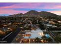 Luxury home with pool and mountain views. Expansive property with attractive landscaping at 3807 N 55Th Pl, Phoenix, AZ 85018