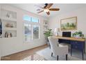 Cozy home office with a built-in desk, natural light, and modern décor at 5026 W Parsons Rd, Phoenix, AZ 85083