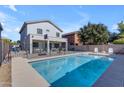 Inviting backyard pool with patio and basketball court at 5341 E Carol Ave, Mesa, AZ 85206