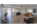 Bright living room with hardwood floors and open floor plan at 639 W Kingman Loop, Casa Grande, AZ 85122