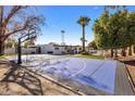 Private backyard sports court with basketball and tennis at 6542 E Ludlow Dr, Scottsdale, AZ 85254