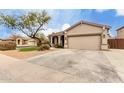 Picture of a single Gathering home with a front yard and a two-car garage at 7709 S 72Nd Dl, Laveen, AZ 85339
