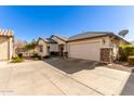 Single-story home with a two-car garage and nicely landscaped yard at 1329 N Balboa --, Mesa, AZ 85205