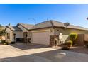 Single-story home with a two-car garage and side yard view at 1329 N Balboa --, Mesa, AZ 85205