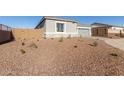 Landscaped front yard with gravel and desert landscaping at 24040 N 172Nd Ave, Surprise, AZ 85387