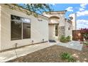 Front entry with stone accents and walkway at 3830 E Carter Dr, Phoenix, AZ 85042