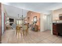 Bright dining area with a table and chairs, adjacent to living room at 4135 N 17Th St # 8, Phoenix, AZ 85016