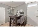 Small dining area with a table and four chairs at 633 W 1St St, Mesa, AZ 85201