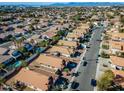 Aerial view of house and neighborhood, showcasing surrounding homes and streets at 1610 W Maplewood St, Chandler, AZ 85286