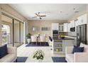 Bright and airy kitchen featuring an island and dining area at 17680 N 77Th Pl, Scottsdale, AZ 85255