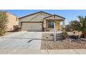 Newly built single story home with a two car garage at 19371 N Nocera Rd, Maricopa, AZ 85138