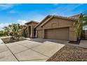 Two-story home with two-car garage and driveway at 21964 N 59Th Ln, Glendale, AZ 85310