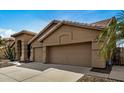 Two-story home with desert landscaping at 21964 N 59Th Ln, Glendale, AZ 85310