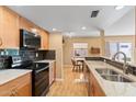 Modern kitchen with granite counters and stainless steel appliances at 5138 N 78Th St, Scottsdale, AZ 85250